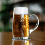 Czech lager beer in glass on a taproom bar featuring Tchecomalt